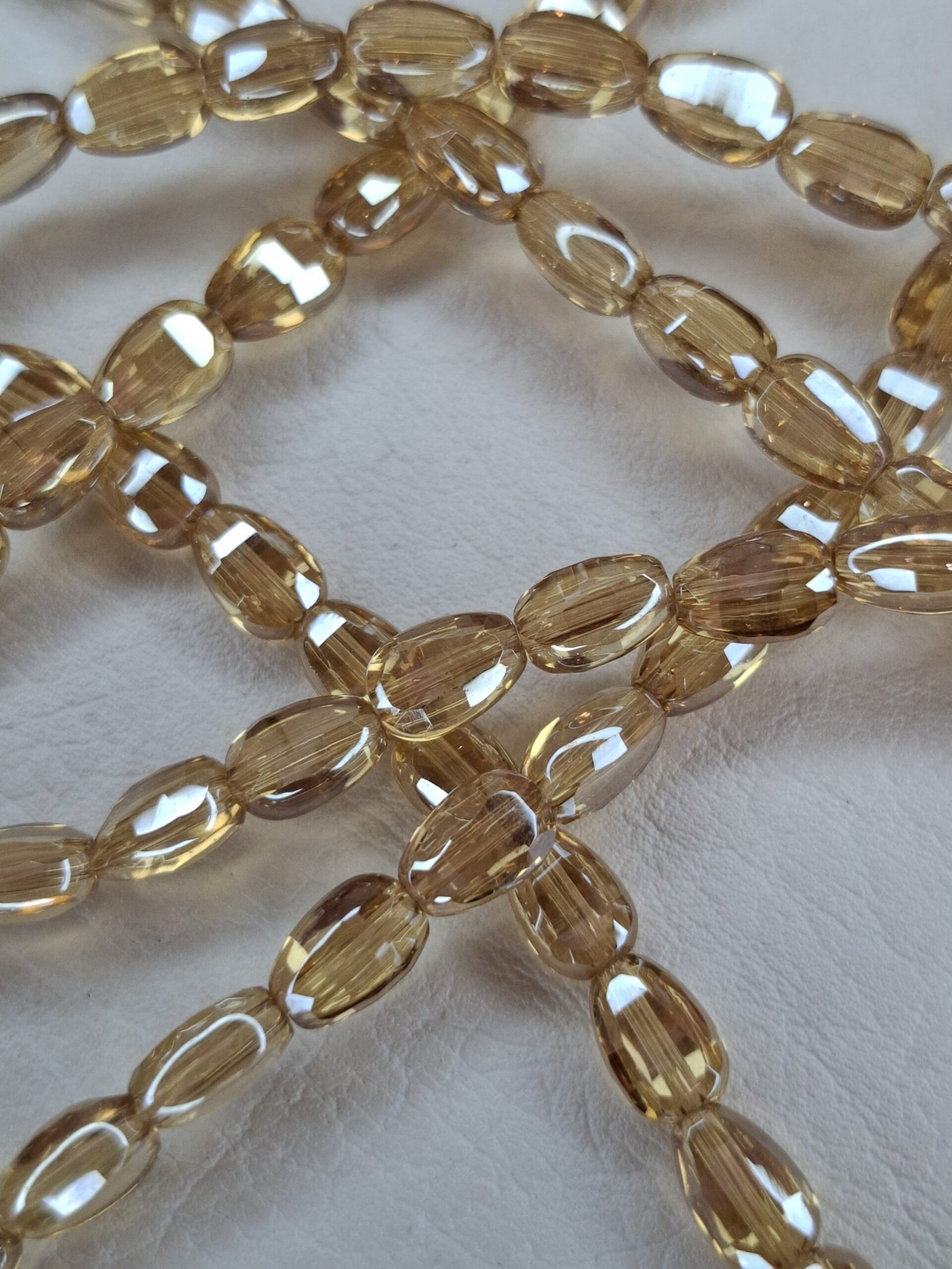 Tira cristal oval dorado claro